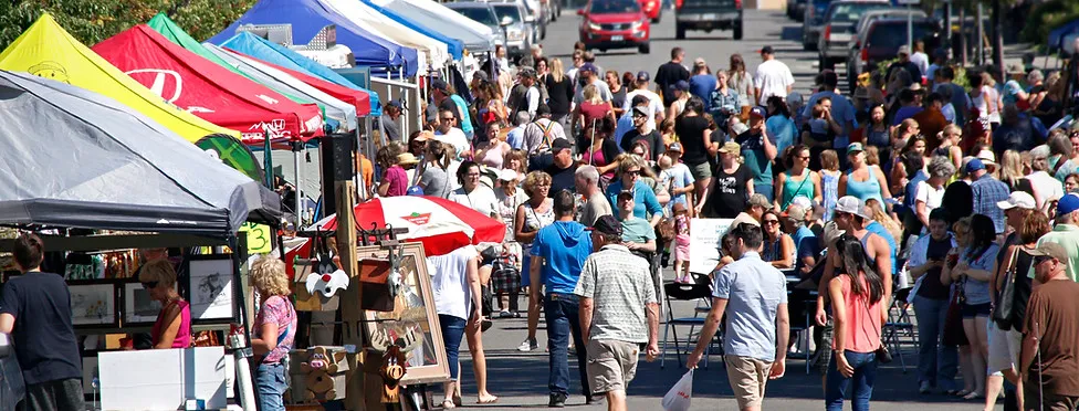 Cranbrook Farmers Market stalls and visitors along 10th Ave South